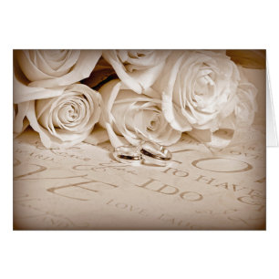 Hochzeitsringe und Rose