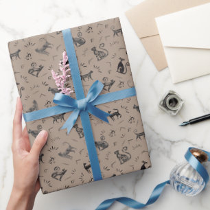Höhlenkunstkatzen auf Hellbraun Geschenkpapier
