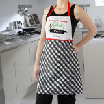 Holiday Cookie Backteam Kariert Weihnachten Schürze<br><div class="desc">Diese niedliche Weihnachtsfeier-Schürze enthält den Text "Holiday Cookie Baking Team". Der untere Teil der Schürze ist kariert schwarz-weiß Schachbrett. Personalisieren Sie diese lustige Schürze mit Ihrem Namen.</div>