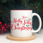 Holly Jolly Christmas Red Script Holiday Zweifarbige Tasse<br><div class="desc">Im Holiday Coffee Tasse Design finden Sie die handgeschriebene Schrifttyp-Typografie "Haben Sie eine Holly Jolly Weihnachten",  mit Blumendarstellungen und grünen Illustrationen in festlichen Rot- und Grüntönen.</div>