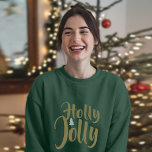 Holly Jolly Green Frohe Weihnachtsschläfchen T-Shirt<br><div class="desc">Mit diesem fröhlichen Damentop kommen Sie in den Weihnachtsgeist. Dieses gemütliche, komfortable Shirt mit einem kühnen "Holly Jolly"-Grafikaufdruck ist der ideale Ort, um Ihre Liebe der Feriensaison zu präsentieren. Dieses langärmelige Tee aus weichem, dehnbarem Watt-Mischgewebe bietet eine entspannte, flachere Passform, die sich ideal für den Alltag eignet. Die reiche, tiefe...</div>
