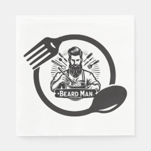 Homme barbu cuisine des serviettes en papier