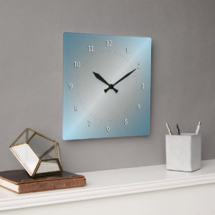 Horloge Carrée Argent et dégradé bleu avec brillant métallique.
