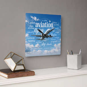 Horloge Carrée Avion volant dans un nuage de mots