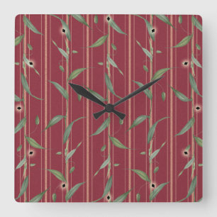 Horloge Carrée Branche de feuilles sur papier peint rouge