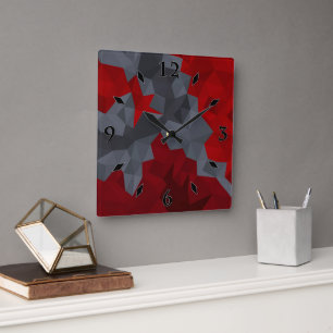 Horloge Carrée Des triangles gris, rouges disposés aléatoirement.