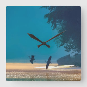 Horloge Carrée Great Blue Herons Take Flight -Teal