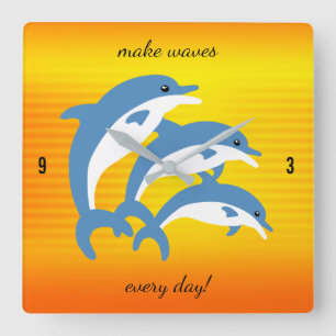 Horloge Carrée Les dauphins bleus dansent sous le soleil tropical