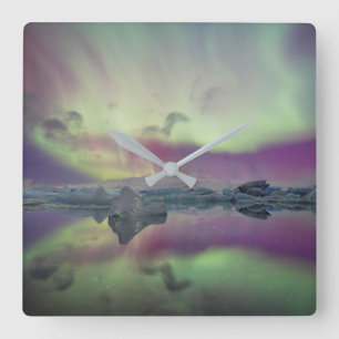 Horloge Carrée Les lumières Aurora reflètent la lagune Islande