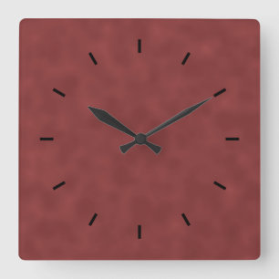 Horloge Carrée Motif Arrière - plan dans les tons rouge foncé.