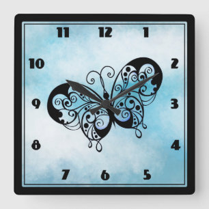 Horloge Carrée Papillon de fantaisie sur un arrière - plan de