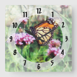 Horloge Carrée Papillon de monarque sur le Lantana rose