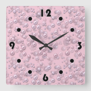 Horloge Carrée Poseurs de perles rose-blanc sur velours rose