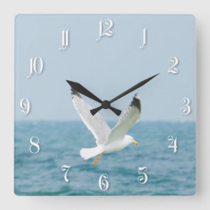 Horloge Carrée Vol de mouette au-dessus de mer