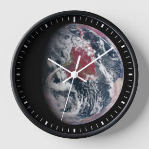 Horloge Croissance plante Sur La Planète Terre.