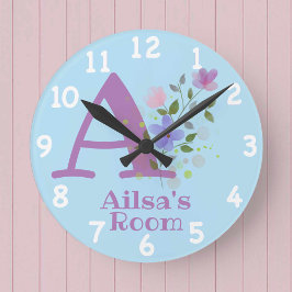 Horloge dans un design floral avec nom et initiale