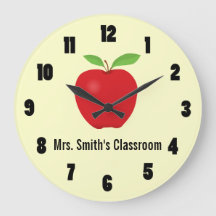Horloge en classe avec une pomme