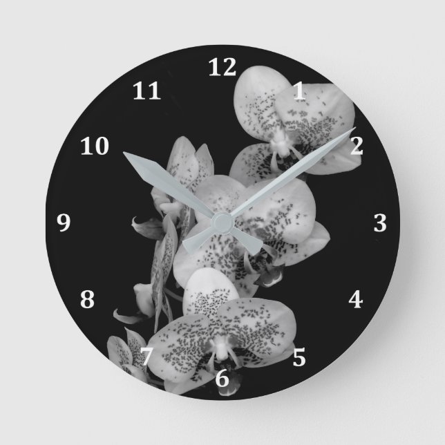 Horloge en noir et blanc avec orchidées (Recto)