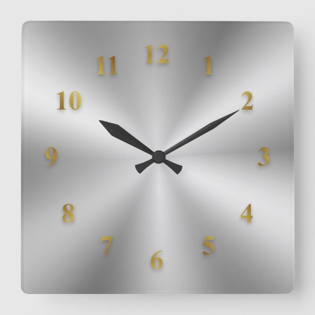 Horloge métallique argentée avec chiffres d'or (Recto)