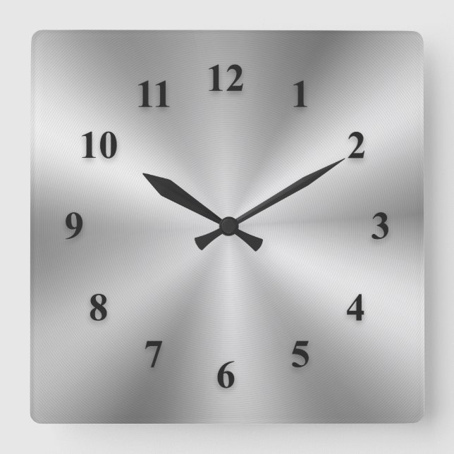 Horloge métallique argentée avec chiffres noirs (Recto)