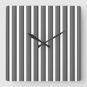 Horloge murale à rayures noires et grises