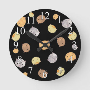Horloge murale aux visages de chat mignons
