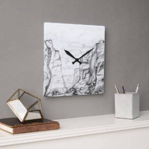 Horloge murale avec canyon esquissé en noir et bla