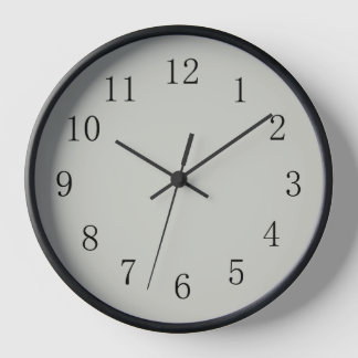 Horloge murale claire gris pastel arrondie (moyenn