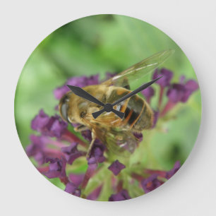 Horloge murale des abeilles et des fleurs violette