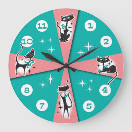 Horloge murale des chats noirs modernes du milieu