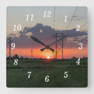 Horloge murale du coucher du soleil sur la ligne