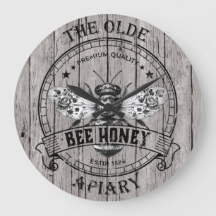 Horloge murale en bois usé vintage abeille