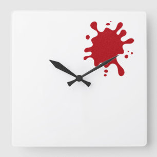 Horloge murale moderne éclaboussée de rouge tomate