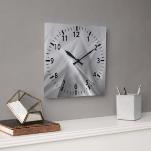 Horloge murale moderne en argent rayonnant