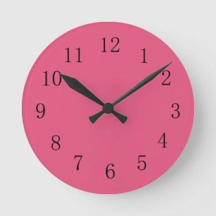 Horloge murale rose sombre de la cuisine