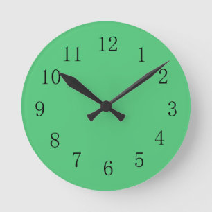 Horloge murale verte de couleur verte