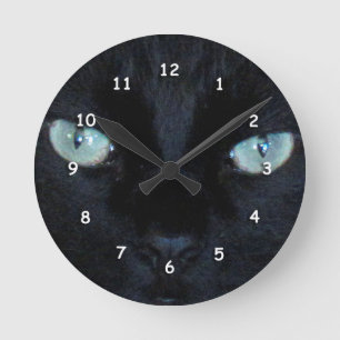 Horloge - Oeil de chat vert