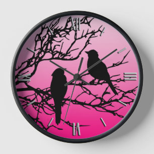 Horloge Oiseaux sur une branche, noirs sur fond rose auror