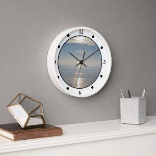 Horloge - Reflets du soleil sur l'océan