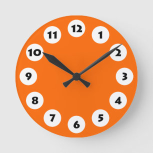 Horloge Ronde 12 Spots - Noir avec blanc sur orange