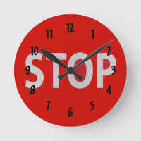 ARRÊTER L'horloge murale de conception des signes