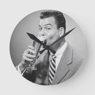 Horloge Ronde Bière potable d'homme d'affaires