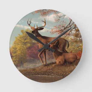 Horloge Ronde Cerfs communs sur une rive d'un lac d'automne