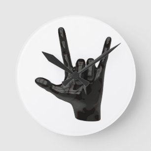 Horloge Ronde cornes diable main