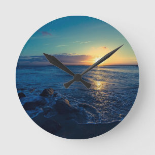 Horloge Ronde Coucher de soleil à l'horizon de l'océan
