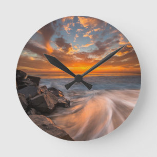 Horloge Ronde Coucher de soleil depuis la plage de Tamarach