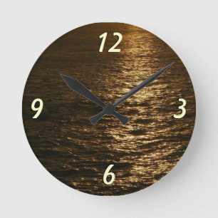 Horloge Ronde Coucher du soleil sur l'eau Photographie de l'océa