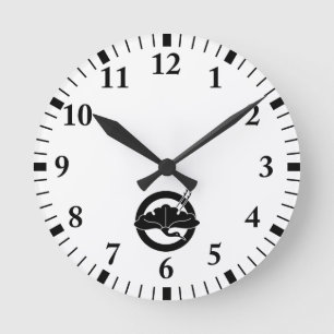 Horloge Ronde Crane-shaped ginkgo leaf on a circle