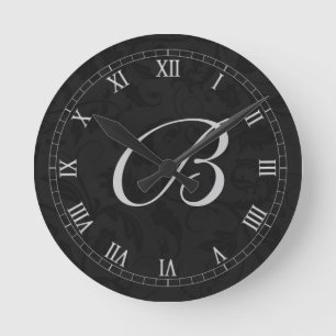 Horloge Ronde Damas noir avec chiffres romains et monogramme