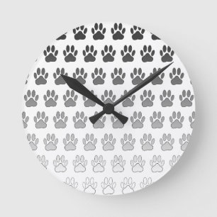 Horloge Ronde Empreintes de pattes dégradés en noir et blanc et